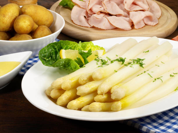 istock White Asparagus Plate with Ham, Potatoes and Chives 1977020233