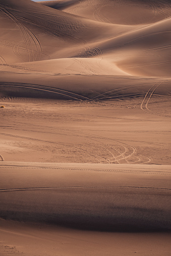 sealine desert or inland sea in qatar where sand dunes meets the ocean.