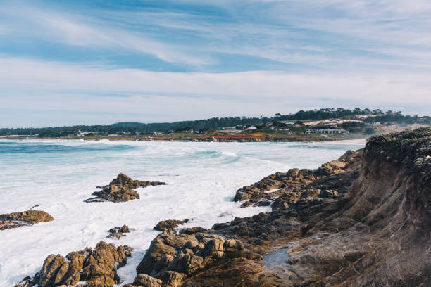 istock White waves hitting rocks on the ocean shore 1977050802