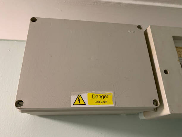 istock White plastic electrical junction job with high voltage warning sticker attached 1977101018