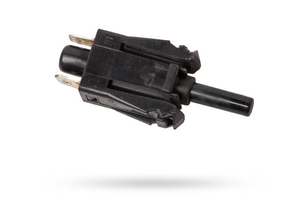 istock brake light switch under the brake pedal in a car on a white isolated background. catalog of spare parts for websites and advertising. 1977101937