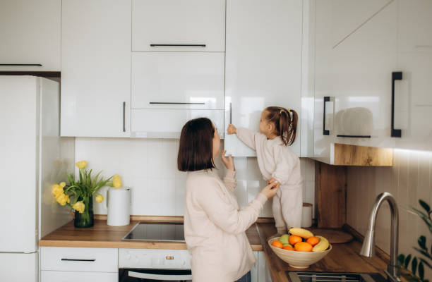 istock Mother and daughter having healthy breakfast in kitchen 1977110361