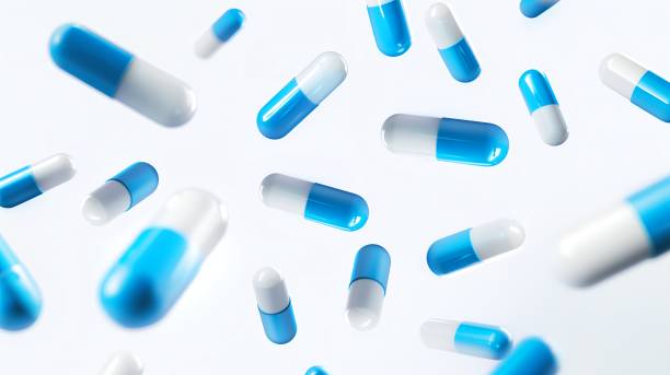 istock Medicine capsules on white background 1977145937