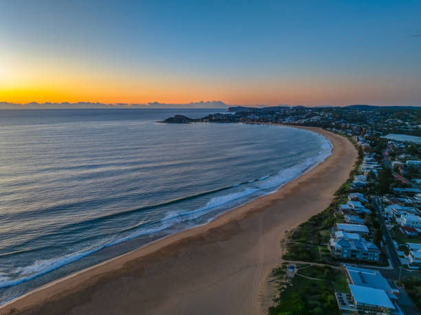 istock Summer sunrise at the seaside lagoon 1977159284