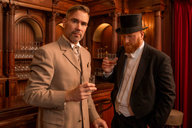 istock Two handsome elegant 1920s style gentlemen in a luxury stately home 1977180179
