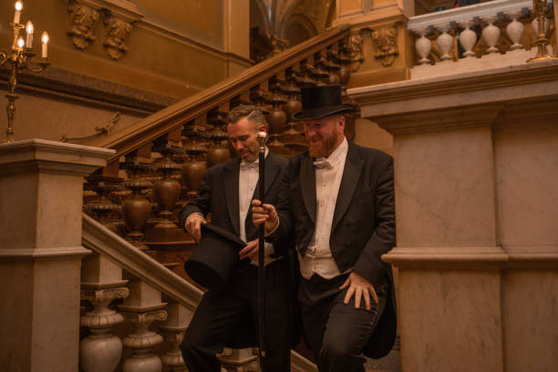 istock Two handsome elegant 1920s style gentlemen in a luxury stately home 1977185040