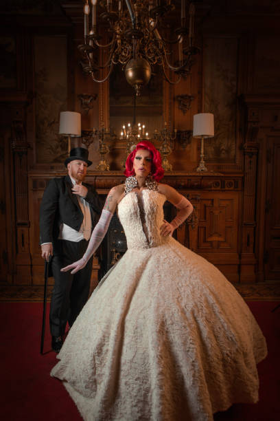 istock A beautiful elegant 1920s style redhead drag queen with a chaperone 1977186074