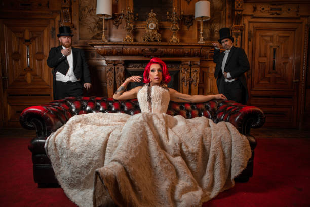 istock A beautiful elegant 1920s style redhead drag queen with chaperones 1977187184