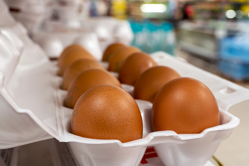 Chicken eggs on the store shelf.
