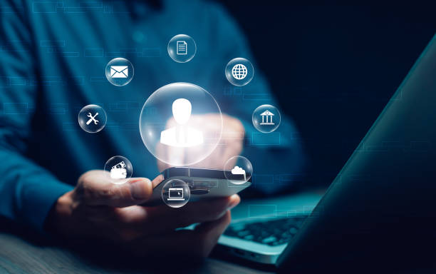 istock businessman holding smartphone Personal information file storage concept ,HR checklists of employees Corporate data management system and document management system with employee privacy. 1977192574