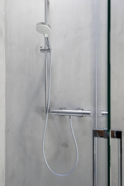 istock Shower head and temperature control of a modern bathroom 1977194253