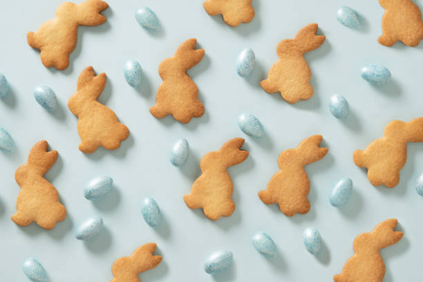 istock Easter cookies shaped of bunny and chocolate sweets candy as eggs . 1977198044