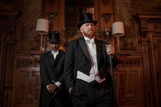 istock Two handsome 1920s style gentlemen in a drawing room 1977201746