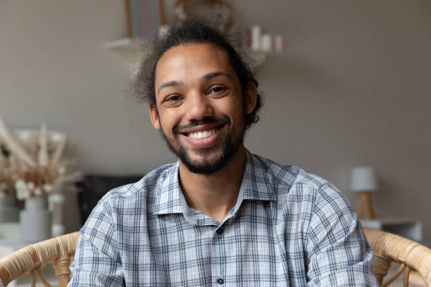 istock Happy millennial African American hipster guy looking at camera 1977202292