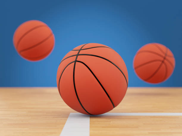 A young Asian woman, dressed in a red basketball jersey, is holding a basketball and pointing with her right index finger.  She appears focused and determined, embodying the spirit of a dedicated athlete. The image highlights the passion and commitment associated with the sport of basketball.