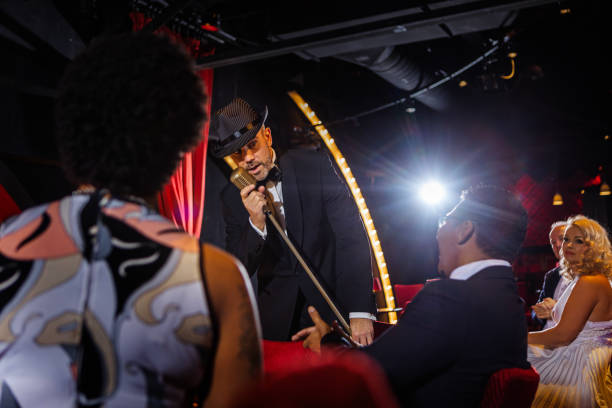 Handsome male singer on stage in front of an audience