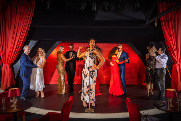 istock Small group of singers and dancers on stage during their performance 1977265746