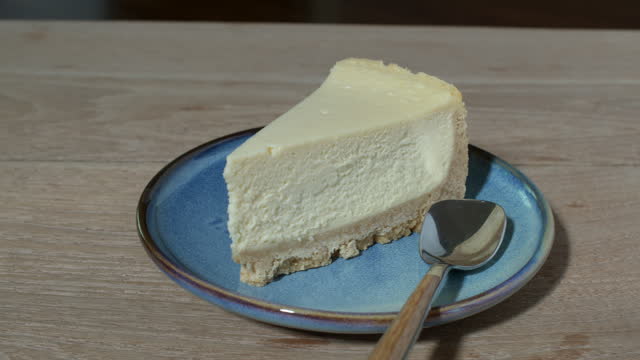 Slice of New York cheesecake.