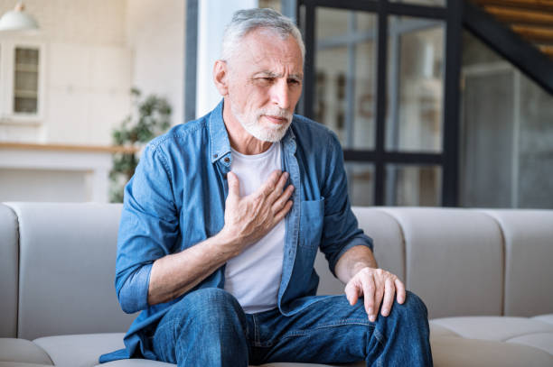 istock Mature man have asthma disease, respiratory, breathing problem 1977287826