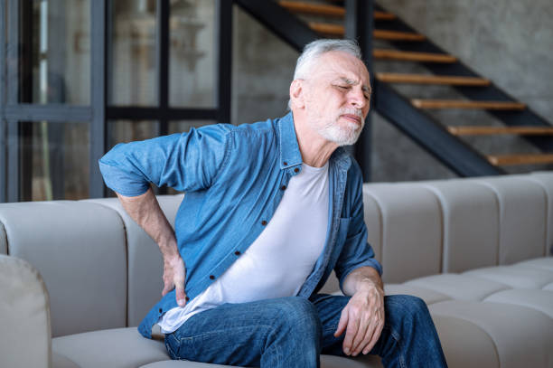 istock Middle aged man feeling unwell and suffering from chronic backache 1977287833