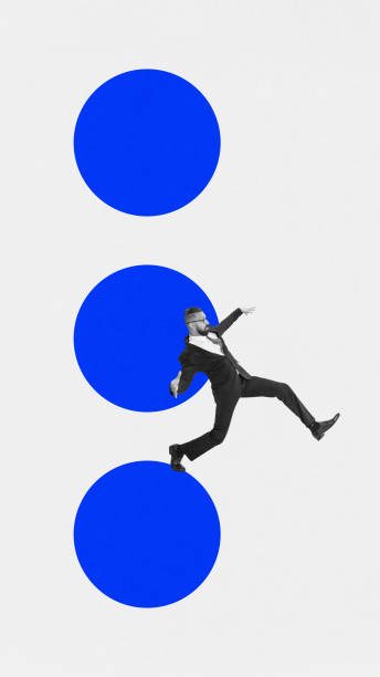 istock Modern aesthetic artwork. Businessman in mid-jump across three blue circles, expressing dynamism and ambition. 1977315224