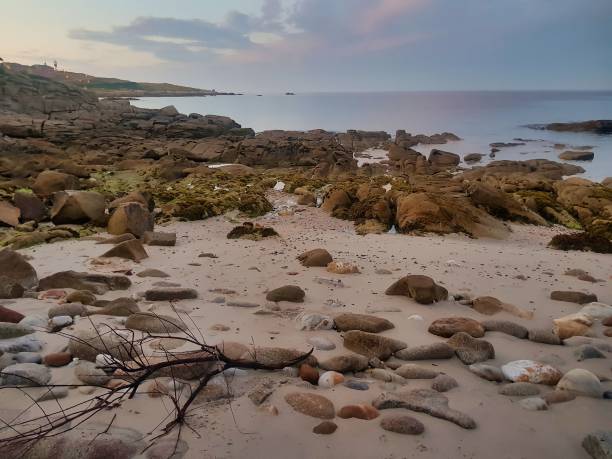 istock rocks and sea, photo as a background 1977320653