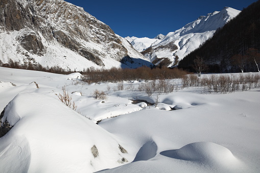 Photo taken towards the east when I arrived at Plan de Parouart. In the Alpes-de-Haute-Provence near the hamlets of Maljasset and Combe Brémond in Haute Ubaye the Plan de Parouart 2050m where there was more than 100 years ago an old lake today filled. This flat place is crossed by a very calm Ubaye which is divided into several arms.