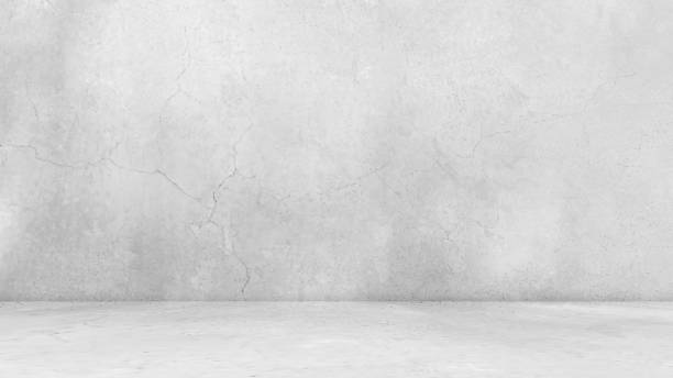 istock Empty gray concrete room studio background. Grunge and rough background. 1977381560