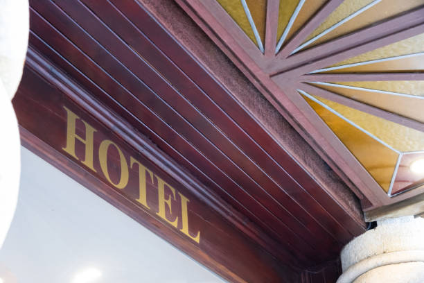 Hotel sign logo text Sign on facade Building