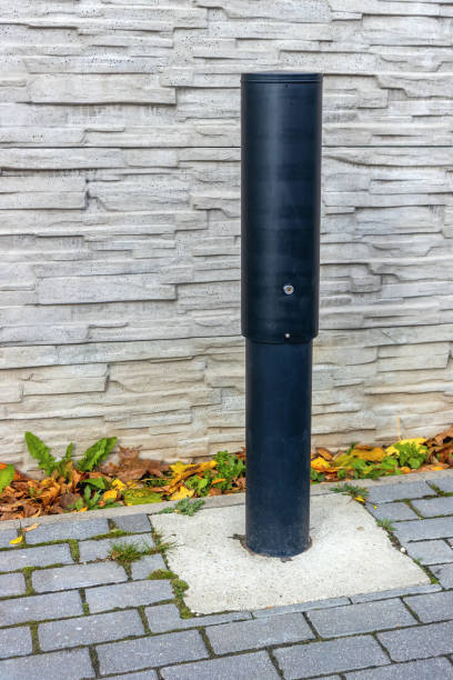 istock Telecommunication column near the sidewalk up close 1977410021