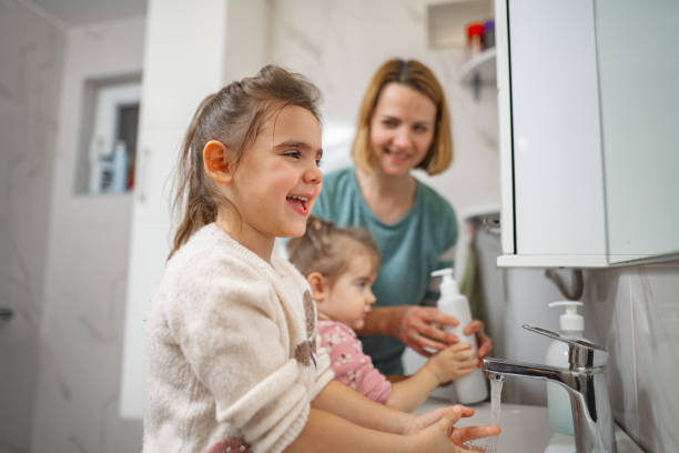 istock Mother Teaching Kids Facial Hygiene 1977424242
