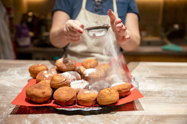 istock Italian Bomboloni Doughnuts - Bomba with powdered sugar 1977431264