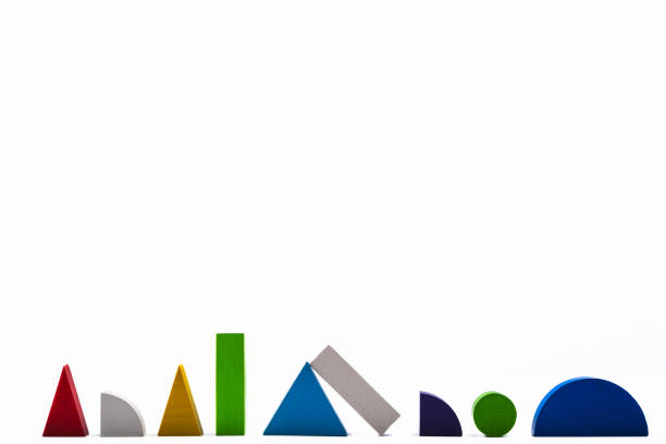 Colorful geometric shapes on white background with copy space for text.