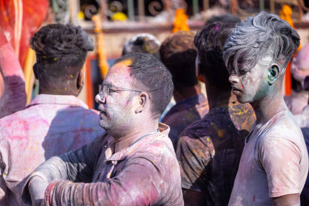 People celebrating masan holi at manikarnika ghat in varanasi stock photo