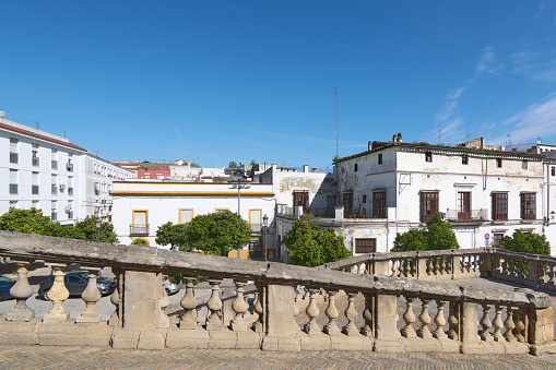 Sunny view of a charming historic village with classic architecture in Jerez de la Frontera in Spain