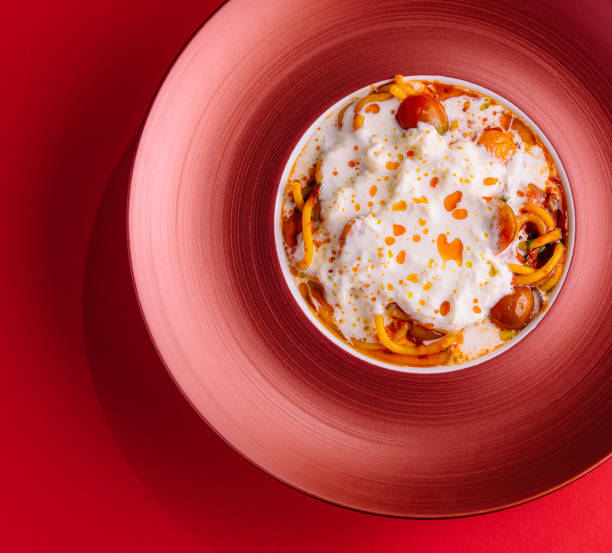Italian spaghetti pasta with baked cherry tomatoes