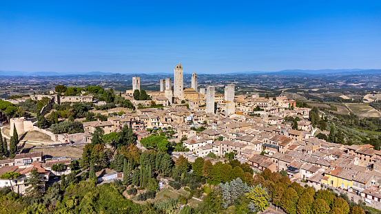 Aerial view of San Gimignano, a small walled medieval hill town in the province of Siena, Tuscany, north-central Italy.