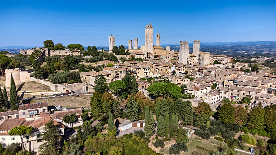Aerial view of San Gimignano, a small walled medieval hill town in the province of Siena, Tuscany, north-central Italy.