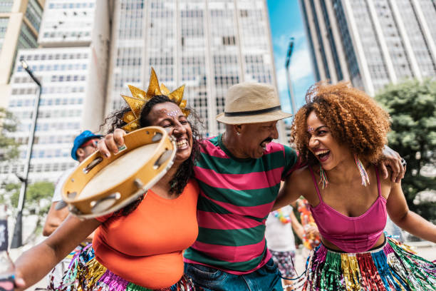 istock Friends having fun at a street carnival party 1977510001