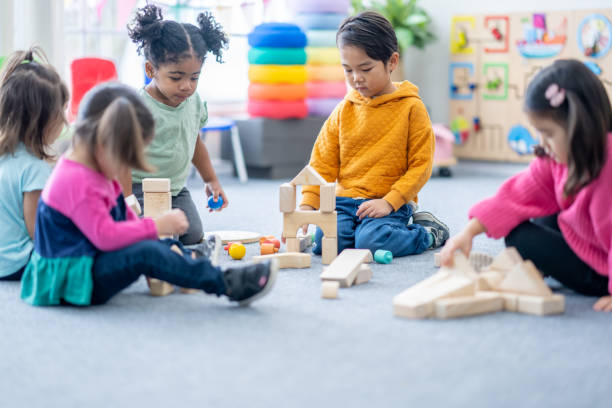 istock Daycare Children Playing Together 1977516125