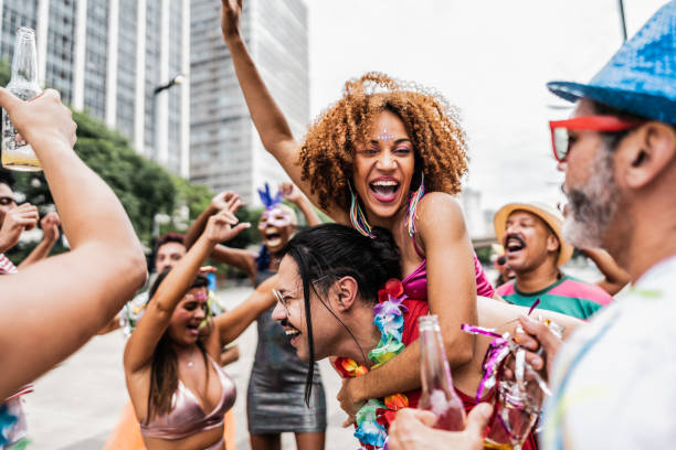 istock Friends having fun at a street carnival party 1977520080