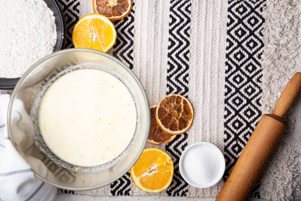 istock Mixing Ingredients for Orange-Infused Cakes 1977550541