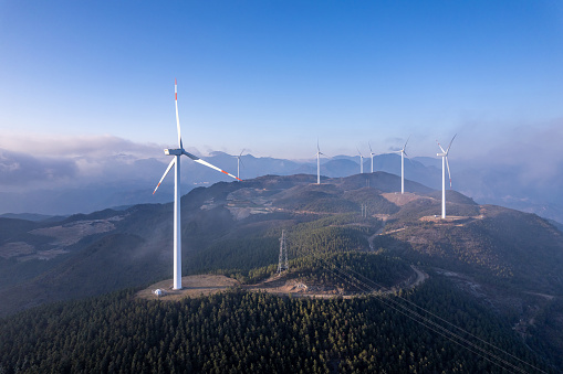 A group of wind turbines on the mountain