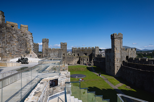 Gwynedd,Great Britain - September 1, 2023: Part of Caernarfon Castle. It is a medieval fortress in Gwynedd