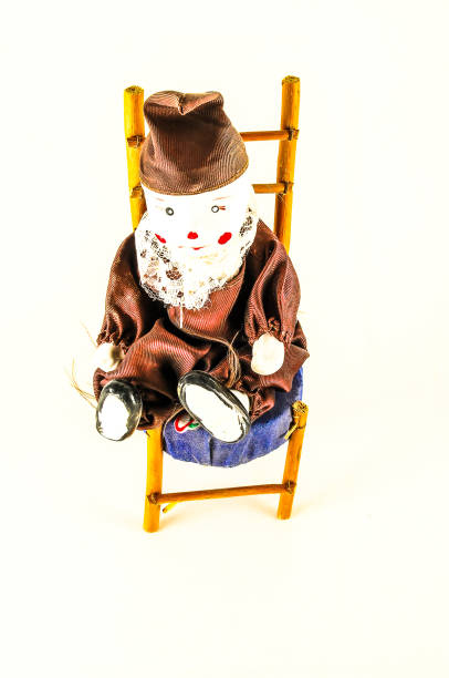 istock Pierrot toy doll on white background 1977586773