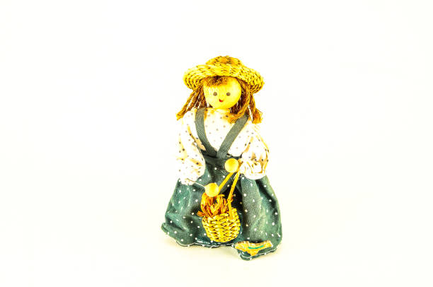 Photo of Pierrot toy doll on white background