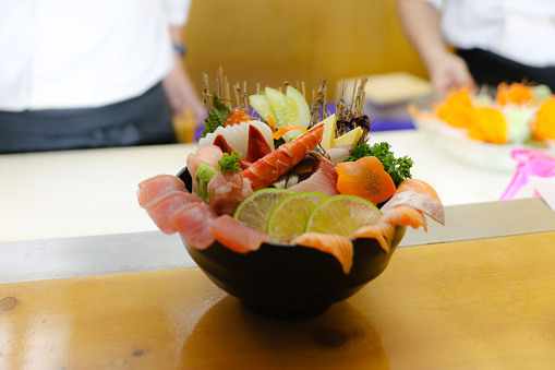 Bowl of rice topped with sashimi in Japan.
Japanese Food.