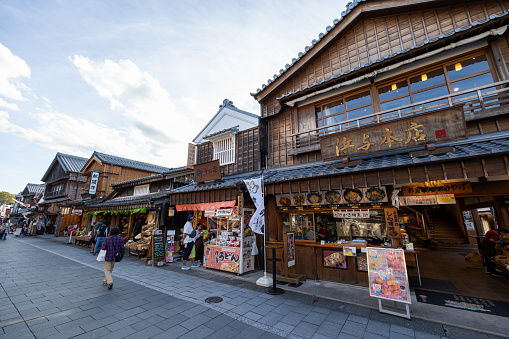 Ise, Japan - October 10, 2023 : People at the Oharai-machi near Ise Jingu Shrine in Ise, Mie Prefecture, Japan. It is a street lined with historical buildings, souvenir shops and restaurants that leads to Ise Jingu shrine.