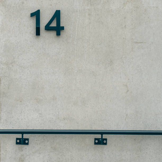 istock gray minimalist exterior facade with handrail and number 14 1977600933