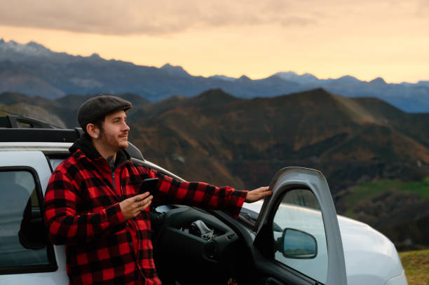 istock man traveling alone in the mountains 1977602773